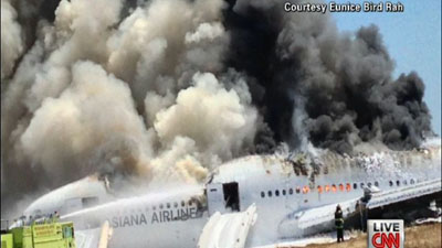 Smoke billows from the Boeing 777 after it crash landed on July 6. Photo courtesy: CNN.