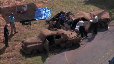 Two vehicles containing the bodies of six people were discovered Tuesday in Foss Lake, which is located a few miles northeast of Elk City, Okla. Photo courtesy: KFOR-TV, Oklahoma City.
