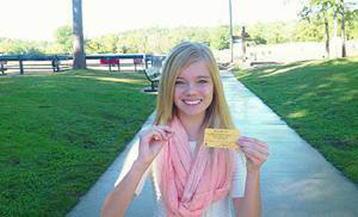 Tana Clymer, 14, poses with the 3.85 carat diamond she found at Arkansas' Crater of Diamonds State Park on Oct. 19. Photo courtesy: KFOR-TV, Oklahoma City.