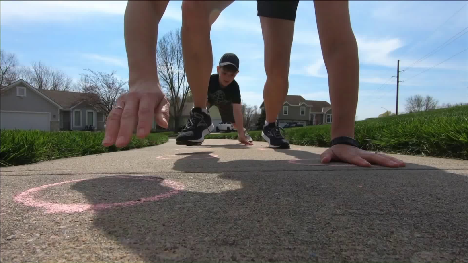 Picture of P.E. outside with sidewalk chalk