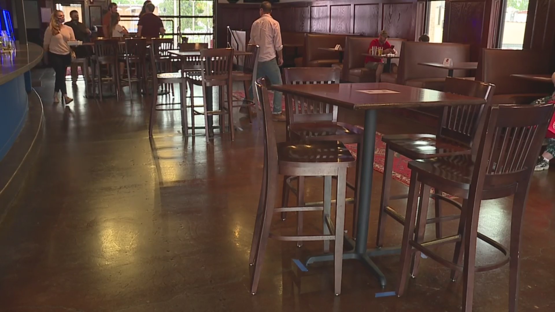 Empty chairs and tables at The Well