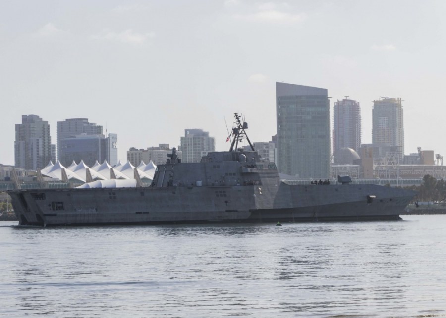 Picture of USS Kansas City against San Diego skyline