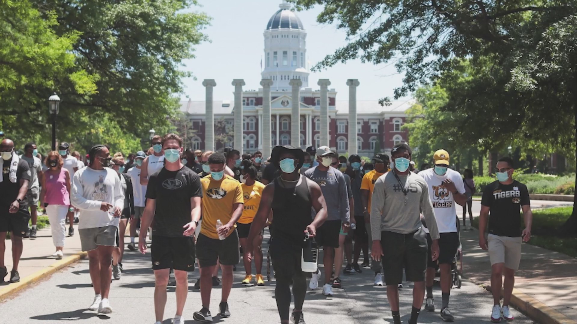Picture of Mizzou football players marching