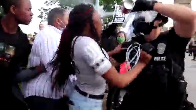 Picture of girl getting pepper sprayed in Kansas City