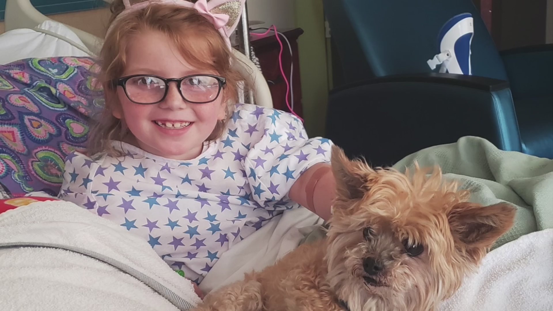 Picture of little girl in hospital bed
