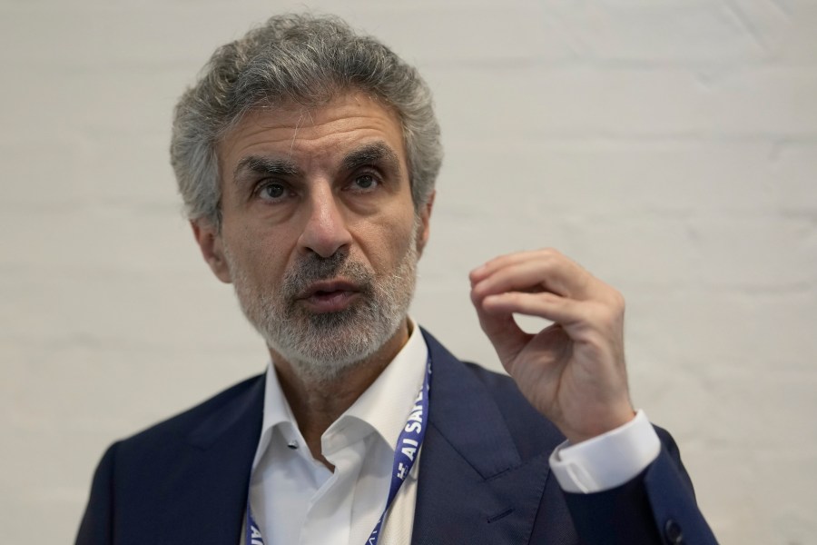 Yoshua Bengio, Scientific Director Mila Quebec AI Institute speaks to the Associated Press during the AI Safety Summit in Bletchley Park, Milton Keynes, England, Wednesday, Nov. 1, 2023. (AP Photo/Alastair Grant)